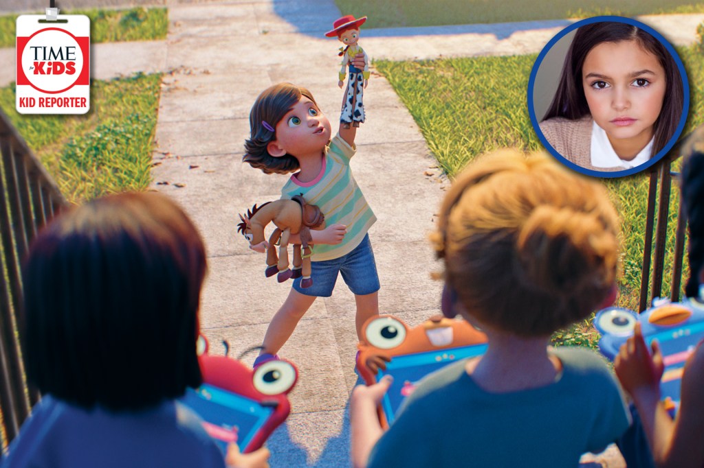 Animated child holds up a doll while other children watch, with a small photo of the voice actor in the corner.