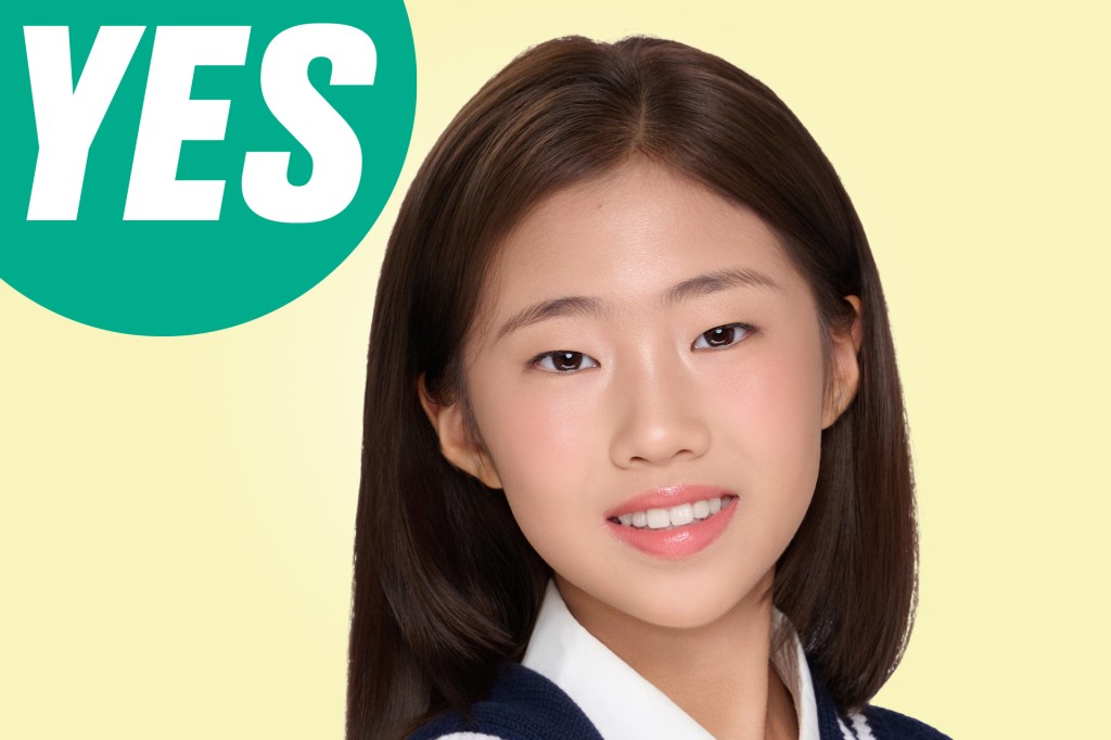 A smiling girl with long dark hair against a light yellow background, with a large green speech bubble that says “YES.”